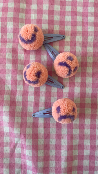 Happy sad pompom hairpins