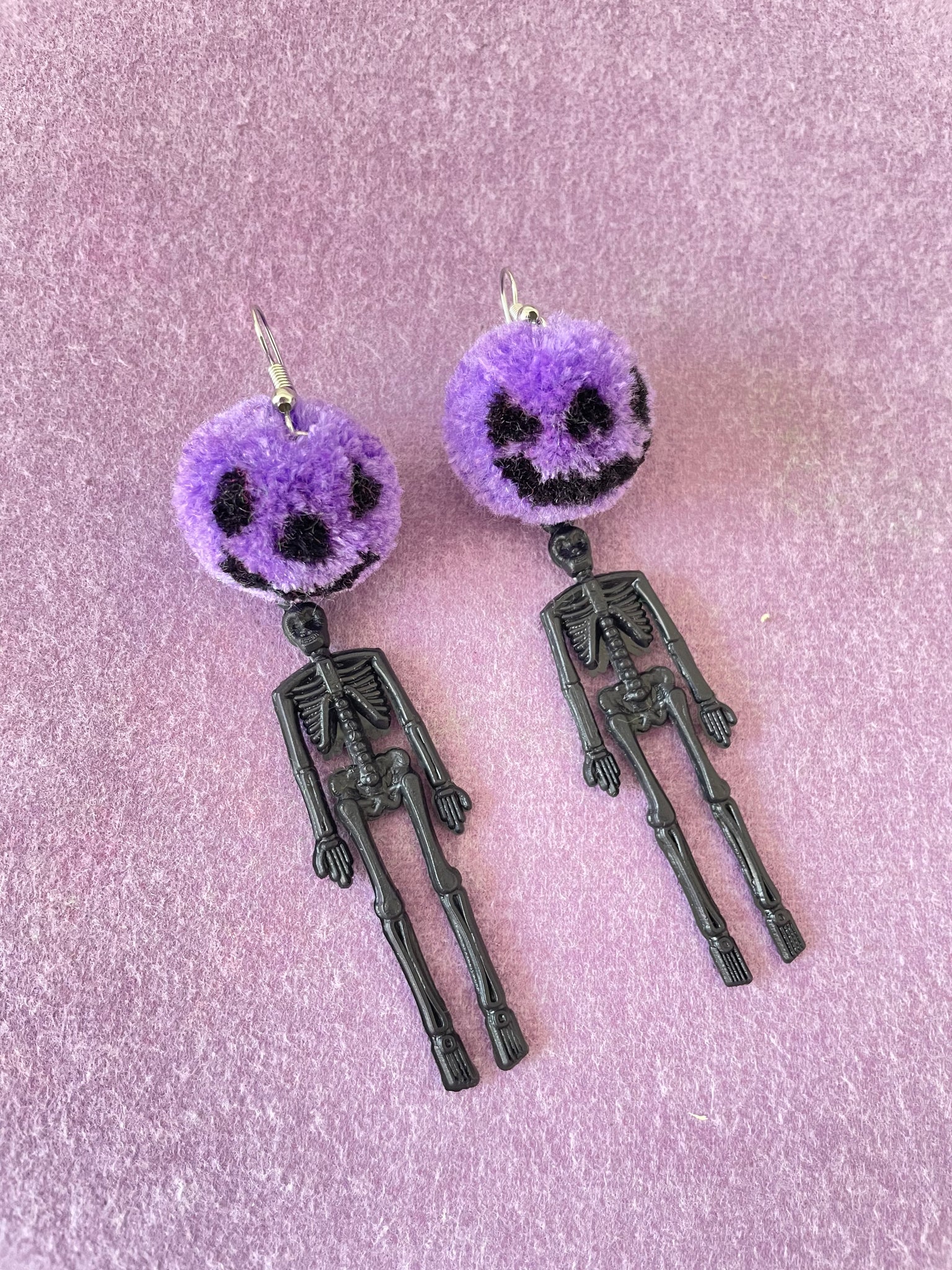 Pumpkin skeleton pompom earrings