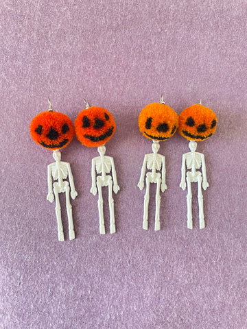 Pumpkin skeleton pompom earrings withe