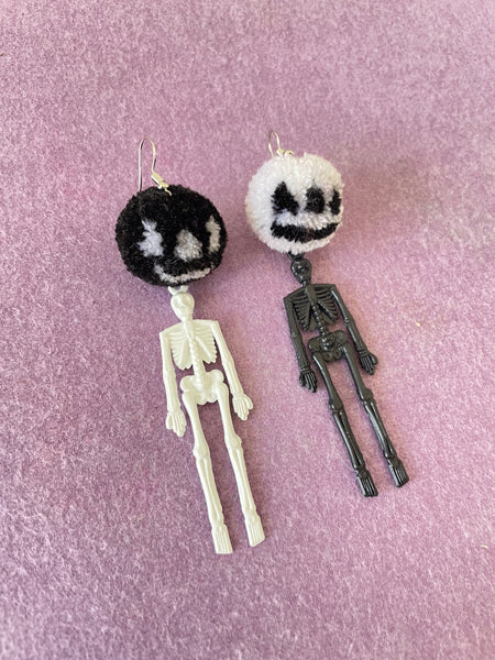 Pumpkin skeleton withe and black pompom earrings