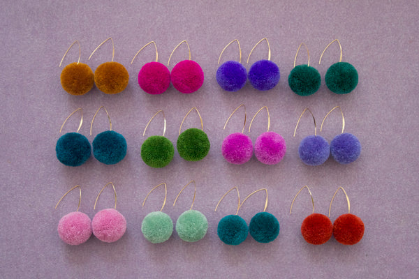 small single color pom pom earrings