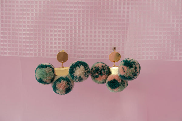 triple pompom earrings