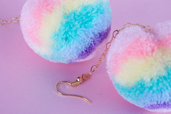 pastel rainbow heart pom earrings