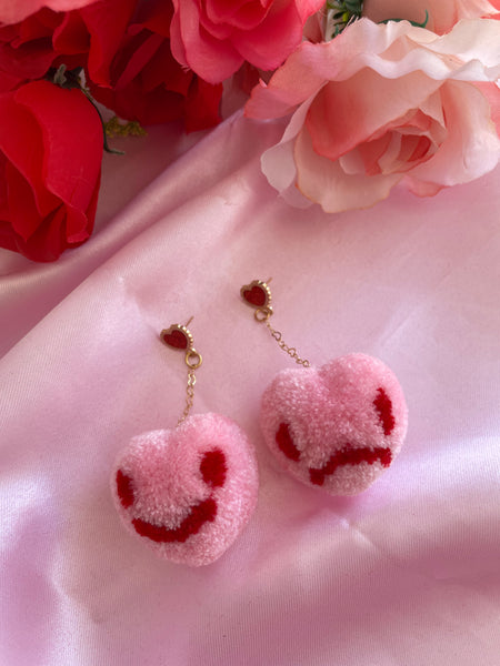 Happy sad heart pompom earrings