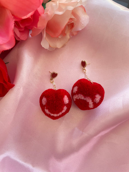 Happy sad heart pompom earrings