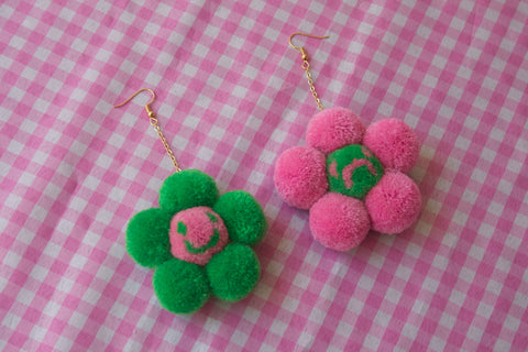 Happy sad daisy pompom earrings